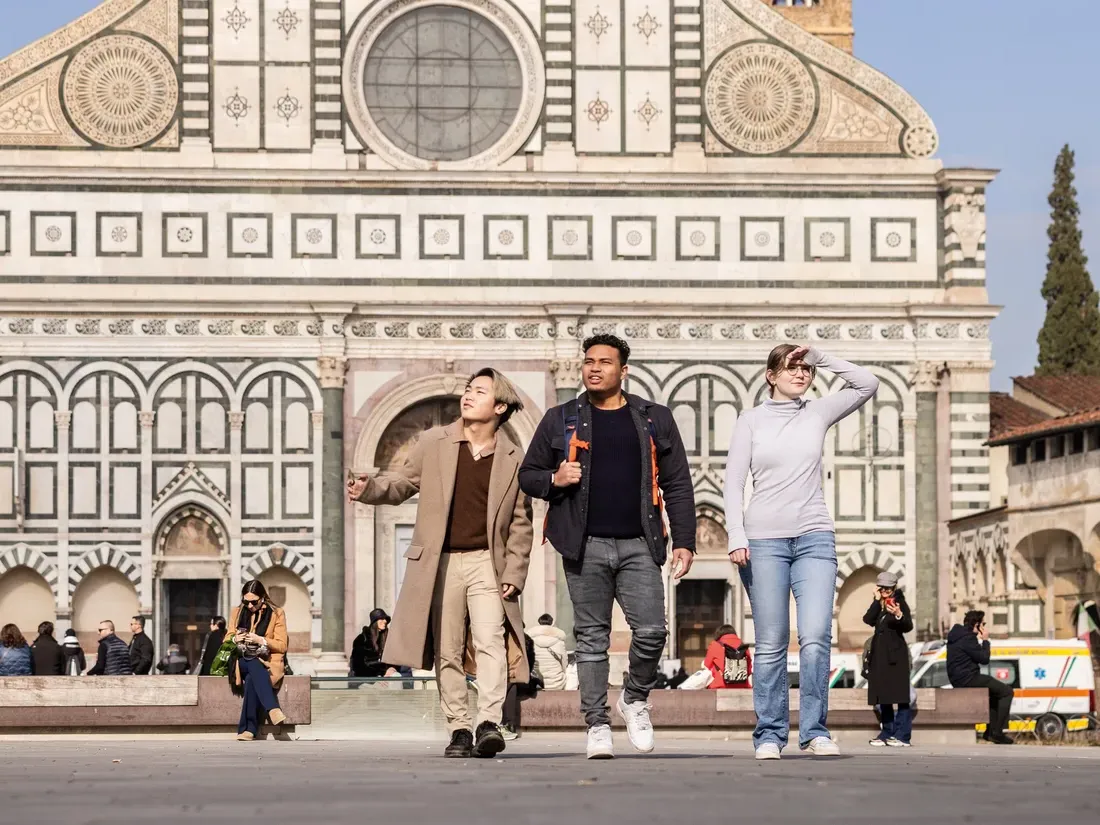 Students walking on a street in Florance.